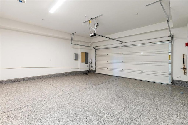 8608 Amherst St, Santee, CA 92071 - garage featuring a garage door opener and electric panel