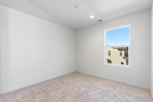 8608 Amherst St, Santee, CA 92071 - carpeted spare room with baseboards and recessed lighting