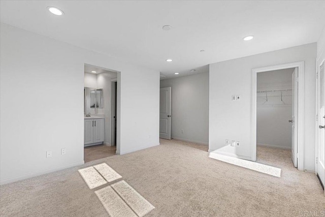 8608 Amherst St, Santee, CA 92071 - unfurnished bedroom with carpet floors, recessed lighting, a walk in closet, a closet, and connected bathroom