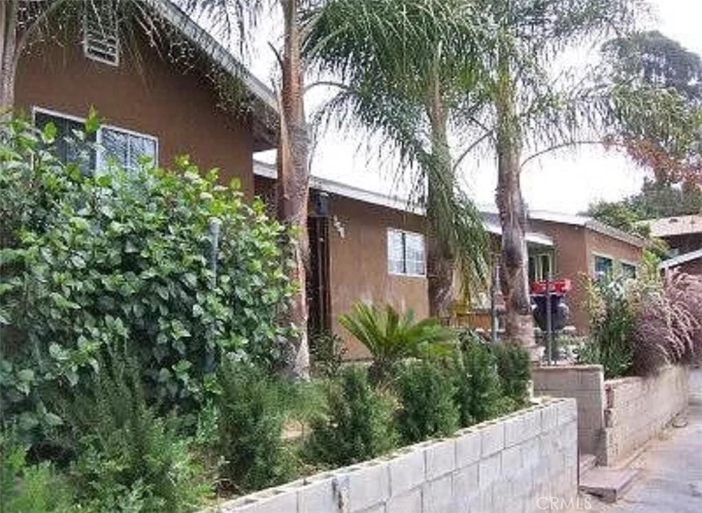 831 N Orange Ave, Fallbrook, CA 92028 - view of property exterior with stucco siding