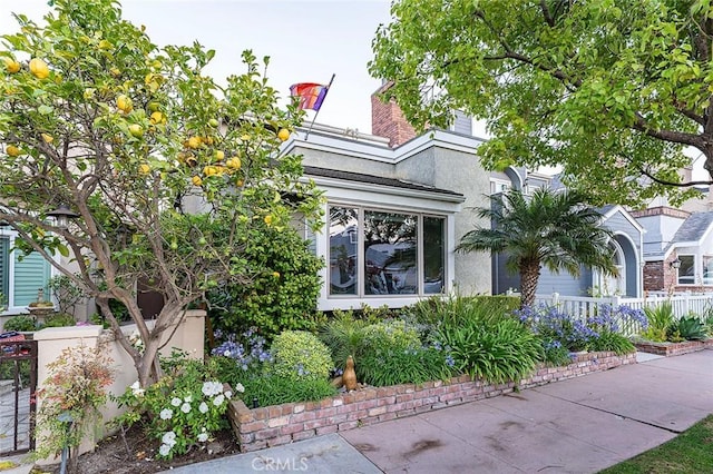 232 7th St, Seal Beach, CA 90740 - view of side of home with stucco siding