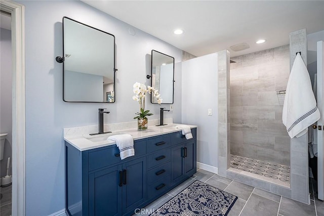 232 7th St, Seal Beach, CA 90740 - full bathroom with double vanity, walk in shower, recessed lighting, and tile patterned floors