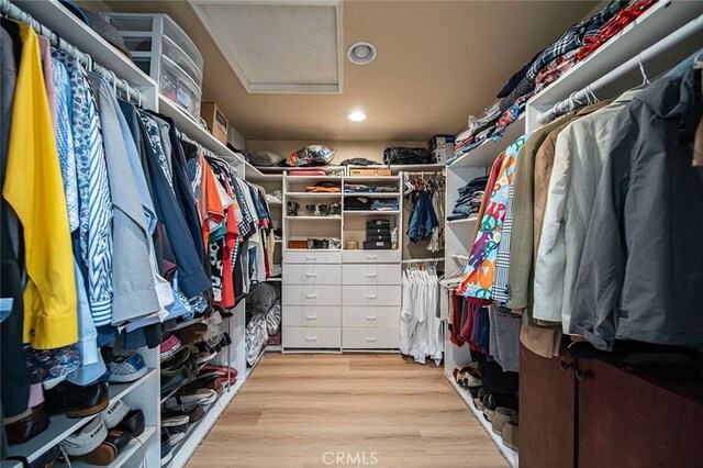 232 7th St, Seal Beach, CA 90740 - spacious closet featuring attic access and wood finished floors