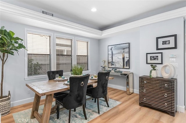232 7th St, Seal Beach, CA 90740 - dining room featuring light wood-style flooring, a raised ceiling, and recessed lighting
