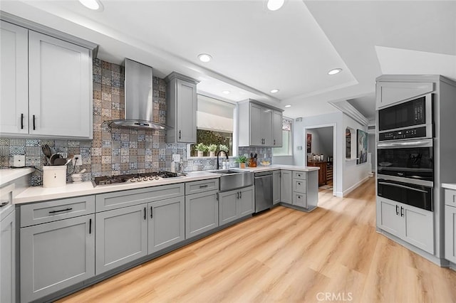 232 7th St, Seal Beach, CA 90740 - kitchen featuring gray cabinetry, a warming drawer, appliances with stainless steel finishes, wall chimney exhaust hood, and recessed lighting