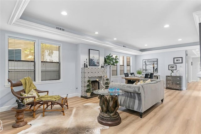 232 7th St, Seal Beach, CA 90740 - living room with a raised ceiling, a fireplace, light wood-style flooring, and recessed lighting