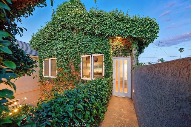 232 7th St, Seal Beach, CA 90740 - doorway to property with stucco siding