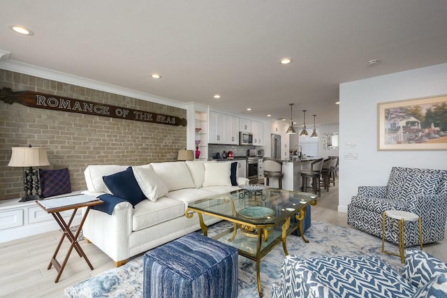 4073 Aladdin Dr, Huntington Beach, CA 92649 - living area featuring recessed lighting, crown molding, and brick wall
