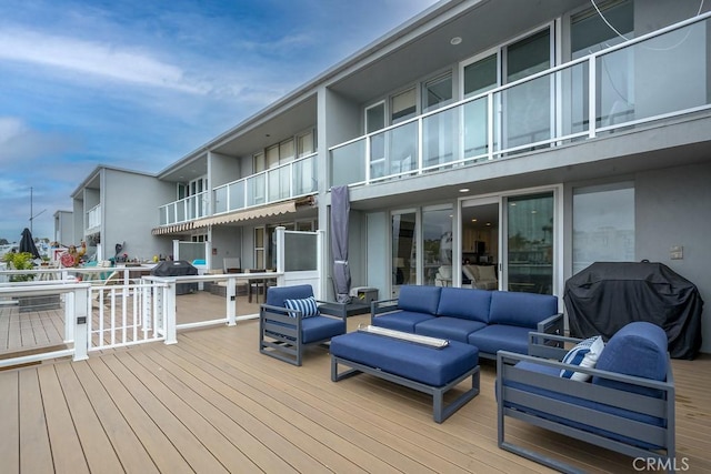 4073 Aladdin Dr, Huntington Beach, CA 92649 - deck with area for grilling and an outdoor living space
