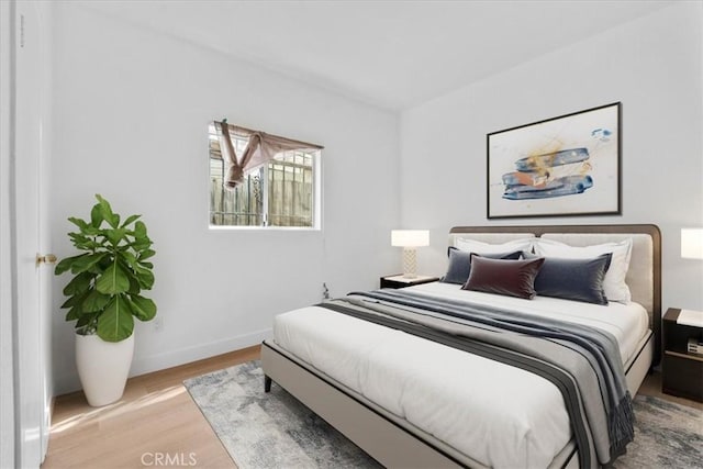 606 N Bonnie Brae St, Los Angeles, CA 90026 - bedroom with wood finished floors and baseboards