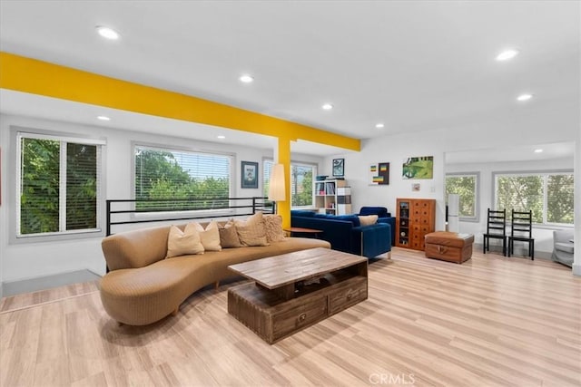 606 N Bonnie Brae St, Los Angeles, CA 90026 - living room with recessed lighting, light wood finished floors, and healthy amount of natural light