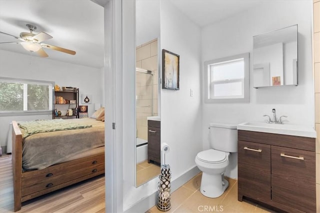 606 N Bonnie Brae St, Los Angeles, CA 90026 - ensuite bathroom with plenty of natural light, vanity, a ceiling fan, and a shower