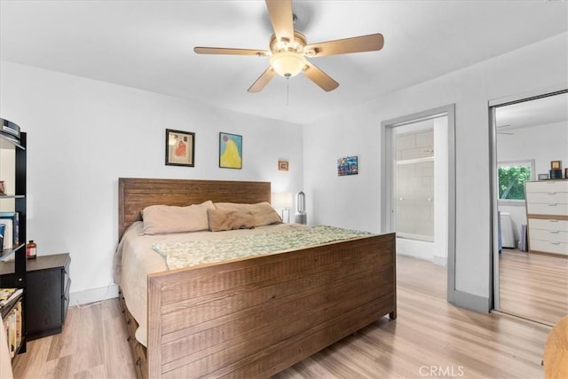 606 N Bonnie Brae St, Los Angeles, CA 90026 - bedroom with light wood-type flooring and a ceiling fan
