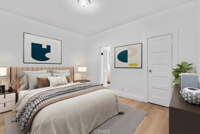 606 N Bonnie Brae St, Los Angeles, CA 90026 - bedroom with light wood-style floors