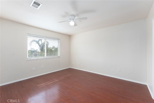 17571 Shamrock Ave, Fontana, CA 92336 - spare room with ceiling fan and dark wood-style flooring