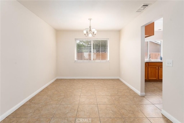17571 Shamrock Ave, Fontana, CA 92336 - empty room with a chandelier and light tile patterned floors