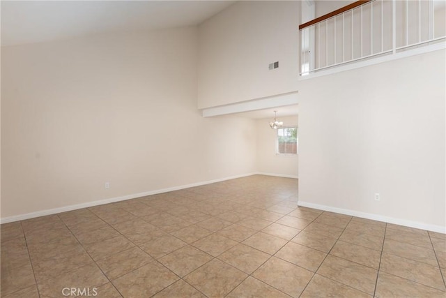 17571 Shamrock Ave, Fontana, CA 92336 - spare room featuring a chandelier and high vaulted ceiling