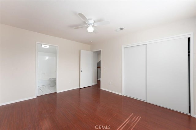17571 Shamrock Ave, Fontana, CA 92336 - unfurnished bedroom featuring wood finished floors, a closet, ceiling fan, and ensuite bathroom