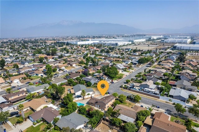 17571 Shamrock Ave, Fontana, CA 92336 - aerial view of property's location with mountains and nearby suburban area