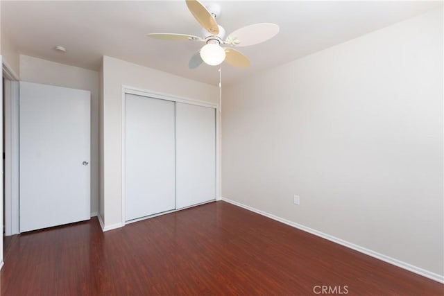 17571 Shamrock Ave, Fontana, CA 92336 - unfurnished bedroom with wood finished floors, a closet, and a ceiling fan