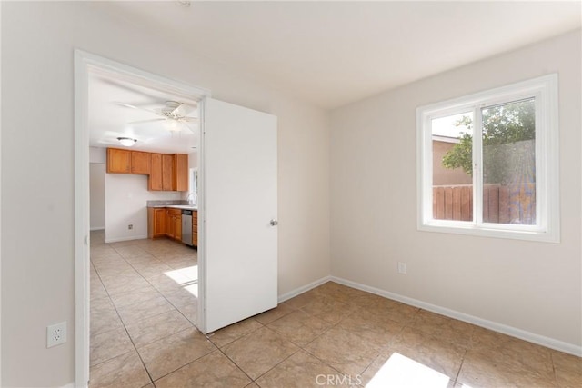17571 Shamrock Ave, Fontana, CA 92336 - empty room with baseboards and ceiling fan