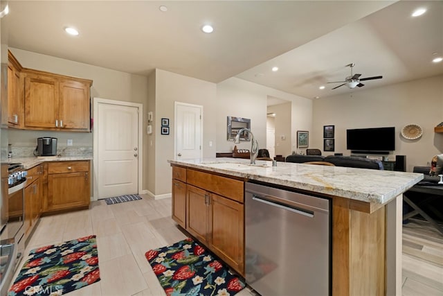 10 Harmony Park Cir, Chico, CA 95973 - kitchen with stainless steel appliances, a ceiling fan, brown cabinetry, recessed lighting, and open floor plan