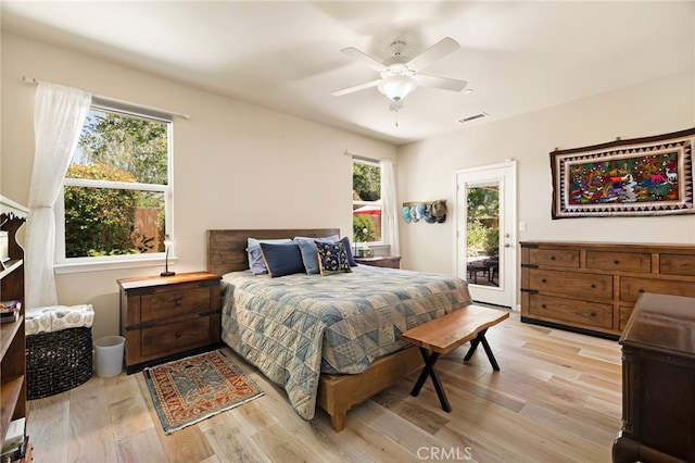 10 Harmony Park Cir, Chico, CA 95973 - bedroom with access to exterior, light wood-style floors, and a ceiling fan