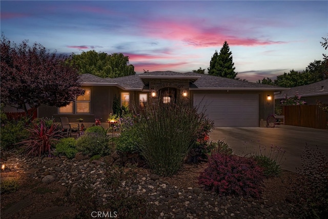 10 Harmony Park Cir, Chico, CA 95973 - ranch-style house featuring a garage, driveway, and stucco siding