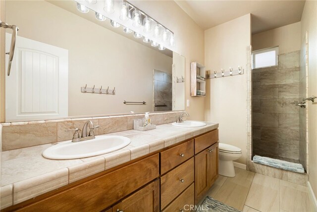 10 Harmony Park Cir, Chico, CA 95973 - full bathroom featuring double vanity and a tile shower