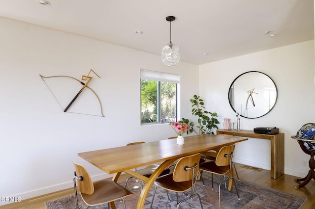 1070 Montecito Dr, Los Angeles, CA 90031 - dining area featuring wood finished floors and recessed lighting