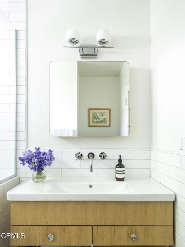 1070 Montecito Dr, Los Angeles, CA 90031 - bathroom featuring tile walls and vanity