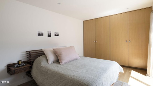 1070 Montecito Dr, Los Angeles, CA 90031 - bedroom with wood finished floors and a closet
