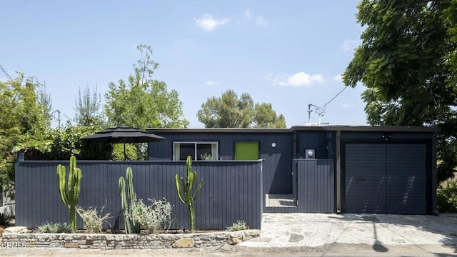 1070 Montecito Dr, Los Angeles, CA 90031 - view of front of home featuring a garage and driveway