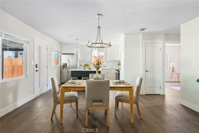112 W Norwood Pl, San Gabriel, CA 91776 - dining room with dark wood-type flooring and a chandelier