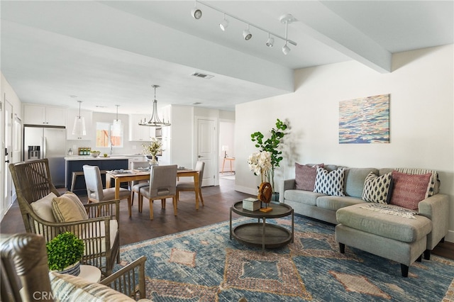 112 W Norwood Pl, San Gabriel, CA 91776 - living area featuring dark wood-style flooring and baseboards
