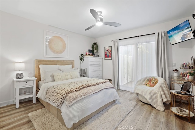 33586 Via Corvalian Unit 23, Dana Point, CA 92629 - bedroom with light wood-style floors and a ceiling fan