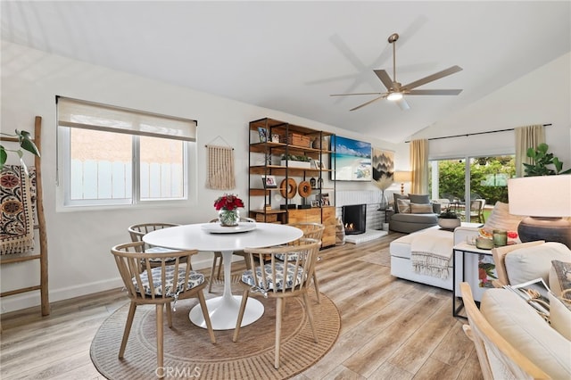 33586 Via Corvalian Unit 23, Dana Point, CA 92629 - dining area featuring ceiling fan, light wood-style floors, and high vaulted ceiling