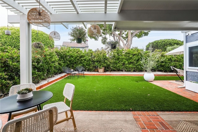33586 Via Corvalian Unit 23, Dana Point, CA 92629 - view of green lawn featuring a pergola and a patio
