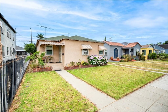 5870 Lemon Ave, Long Beach, CA 90805 - view of front of property with stucco siding and cooling unit