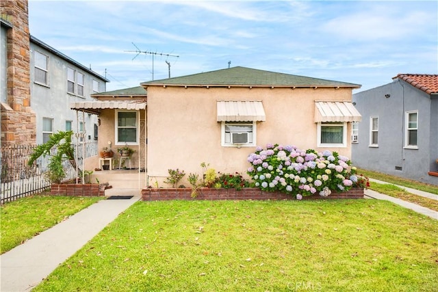 5870 Lemon Ave, Long Beach, CA 90805 - bungalow-style house with stucco siding and cooling unit