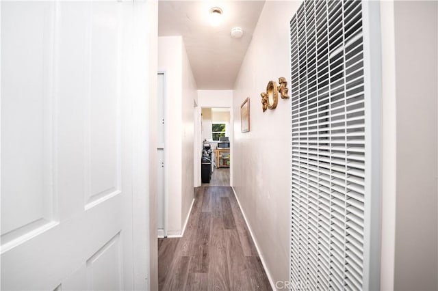 5870 Lemon Ave, Long Beach, CA 90805 - hall with a heating unit and dark wood-type flooring