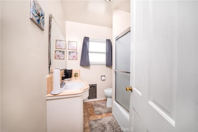 5870 Lemon Ave, Long Beach, CA 90805 - bathroom featuring vanity and bath / shower combo with glass door