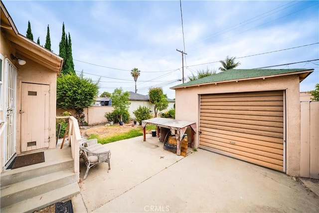 5870 Lemon Ave, Long Beach, CA 90805 - detached garage featuring concrete driveway