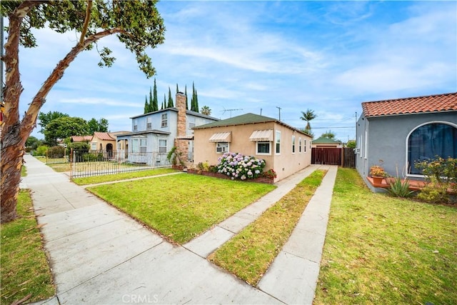 5870 Lemon Ave, Long Beach, CA 90805 - view of front of home with stucco siding and a tiled roof