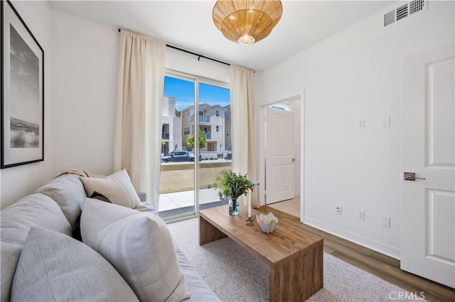 111 Juniper Dr, Rancho Mission Viejo, CA 92694 - living room featuring wood finished floors and baseboards