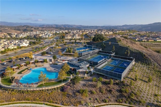 111 Juniper Dr, Rancho Mission Viejo, CA 92694 - aerial perspective of suburban area with a pool and mountains