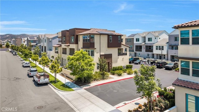 111 Juniper Dr, Rancho Mission Viejo, CA 92694 - view of building exterior with a residential view