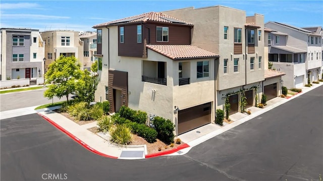 111 Juniper Dr, Rancho Mission Viejo, CA 92694 - view of property with an attached garage and a residential view