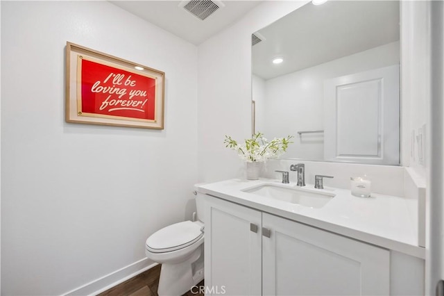111 Juniper Dr, Rancho Mission Viejo, CA 92694 - half bath featuring vanity, wood finished floors, and recessed lighting