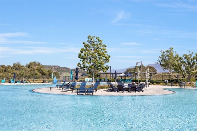 111 Juniper Dr, Rancho Mission Viejo, CA 92694 - community pool featuring a patio area and a mountain view